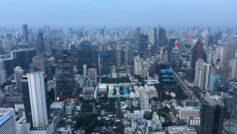 aerial bangkok city thailand - skyscrapers buildings over financial business district downtown.