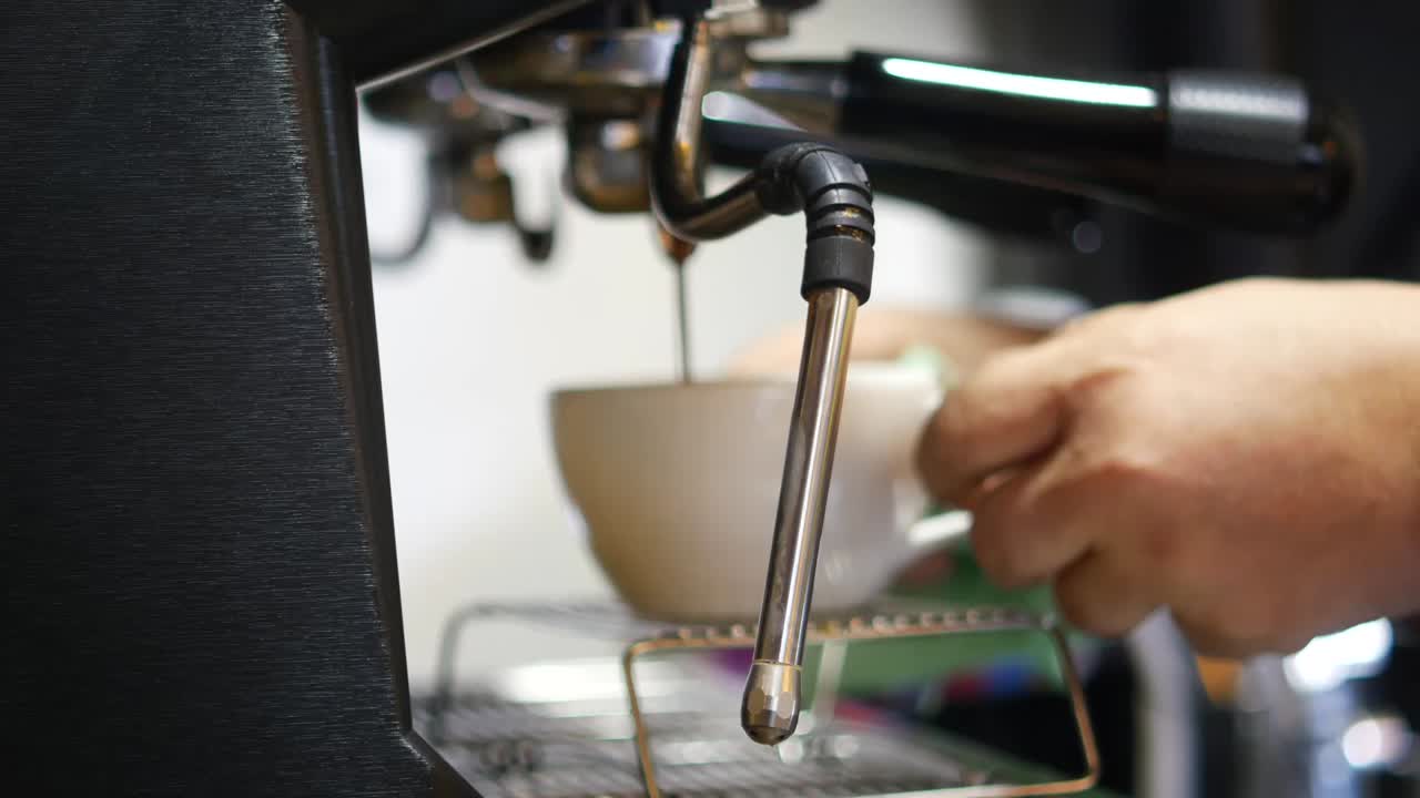 Making coffee with espresso machine