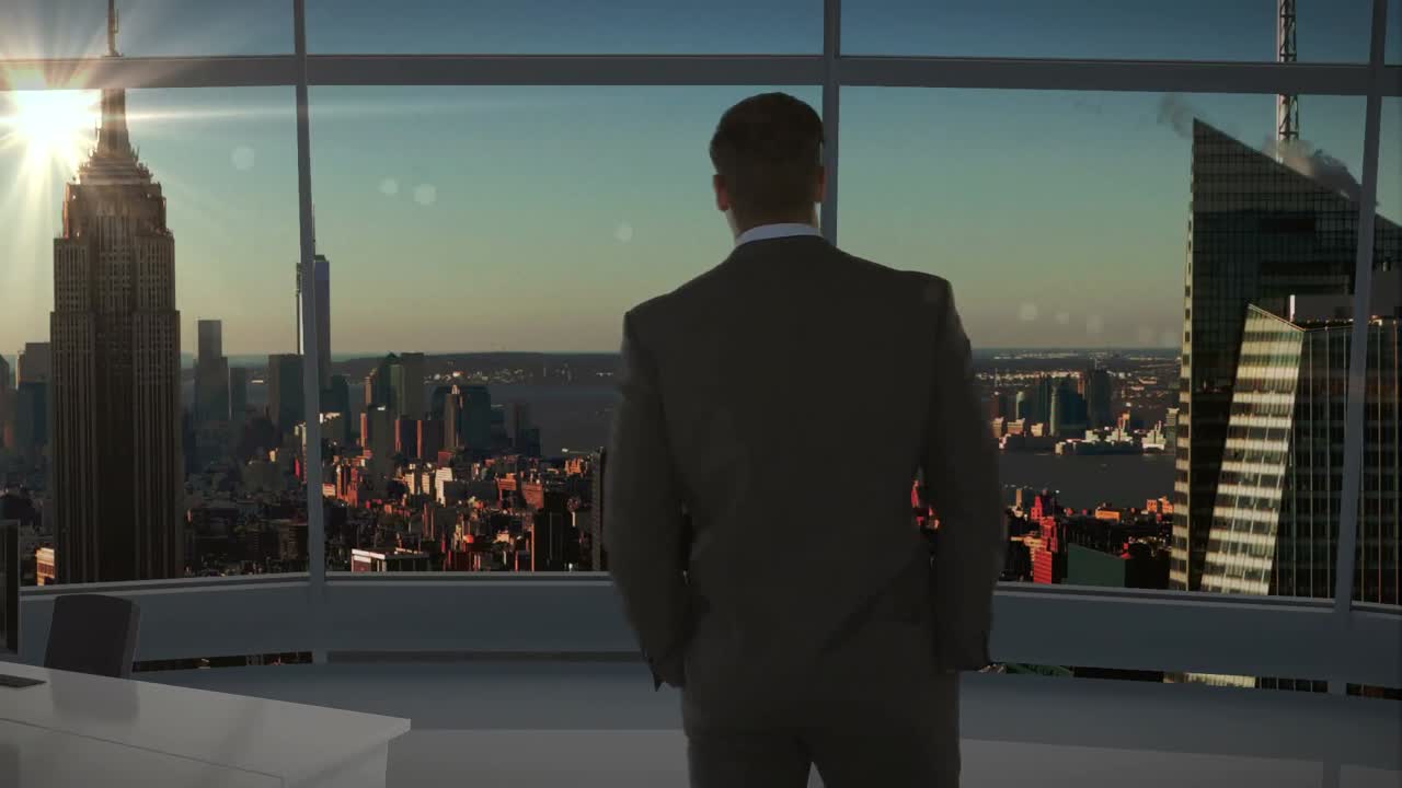 사무실 에 서 있는 사업가 의 뒷면