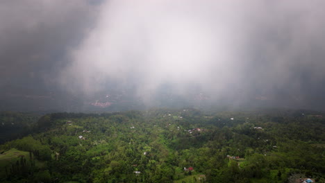 Wide-agricultural-farm-landscape-surrounding-Mount-Batur-in-Bali-on-cloudy-day