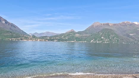 peaceful lake with mountains in background