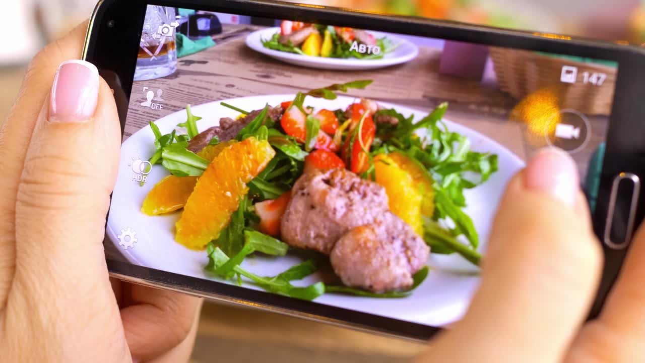 Taking a photo of a delicious salad