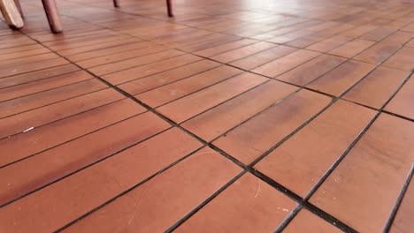 red brick floor tiles with furniture