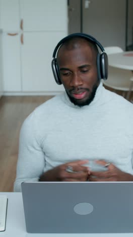 man working from home on laptop