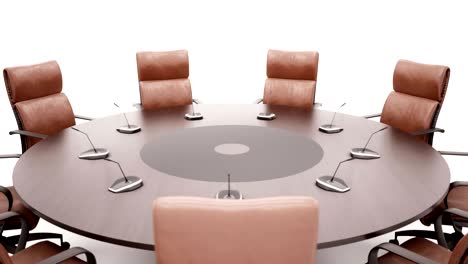 round conference table on white background rotates 360 degrees. closeup.