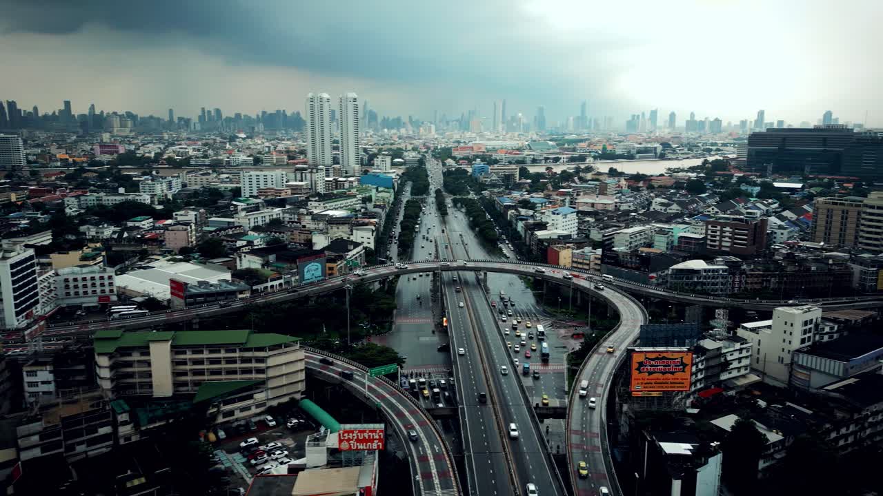 Aerial Scenic Drone Footage of a Highway in Downtown Bangkok, Thailand on a Rainy Day