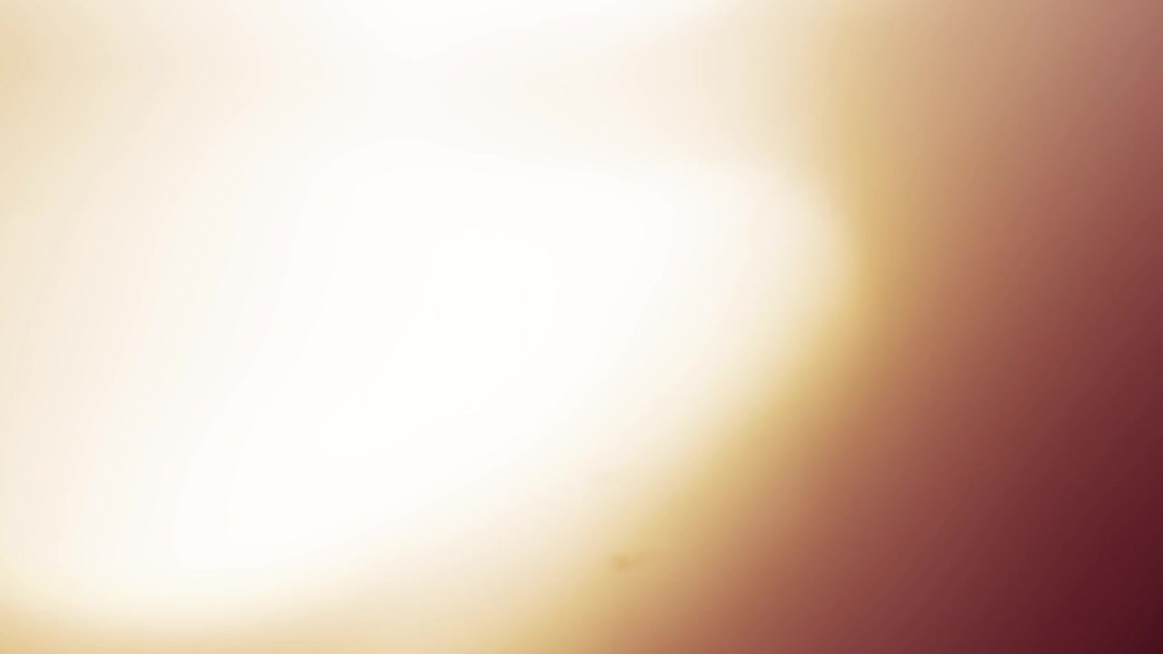 Warm Light Leak Transition with Lens Flare Effect