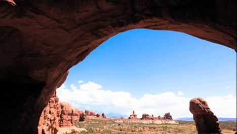 a red sandstone monument in the desert  time lapse