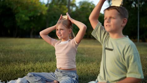 children playing with wooden blocks in a park