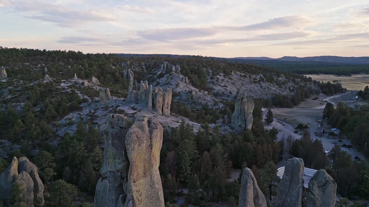 Rock spires and forested hills in Valle de los Monjes at sunset, Creel, Chihuahua, Mexico