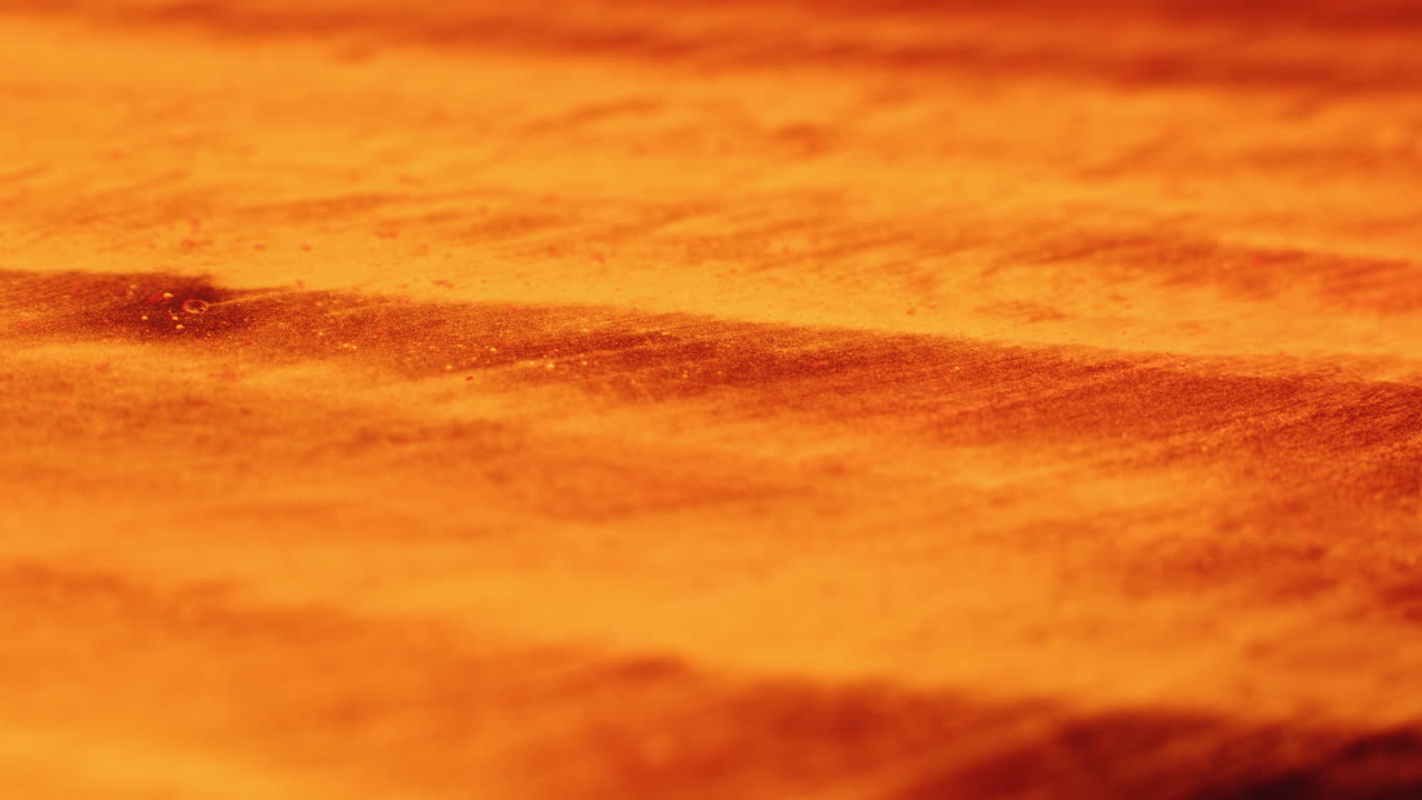 Colourful, organic, liquids macro shots buzzing and flowing