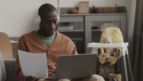 African-American Male Freelancer Working at Home