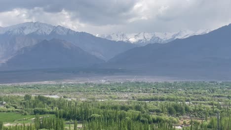 Panoramic-View-Of-Ladakh-Range-From-Field-In-Leh,-Ladakh,-India