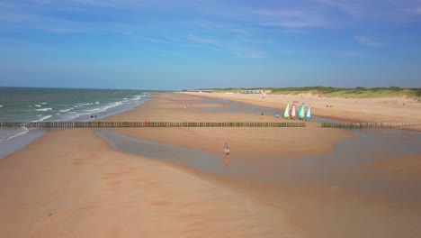 The-beach-of-Cadzand-Bad,-the-Netherlands-during-a-sunny-day