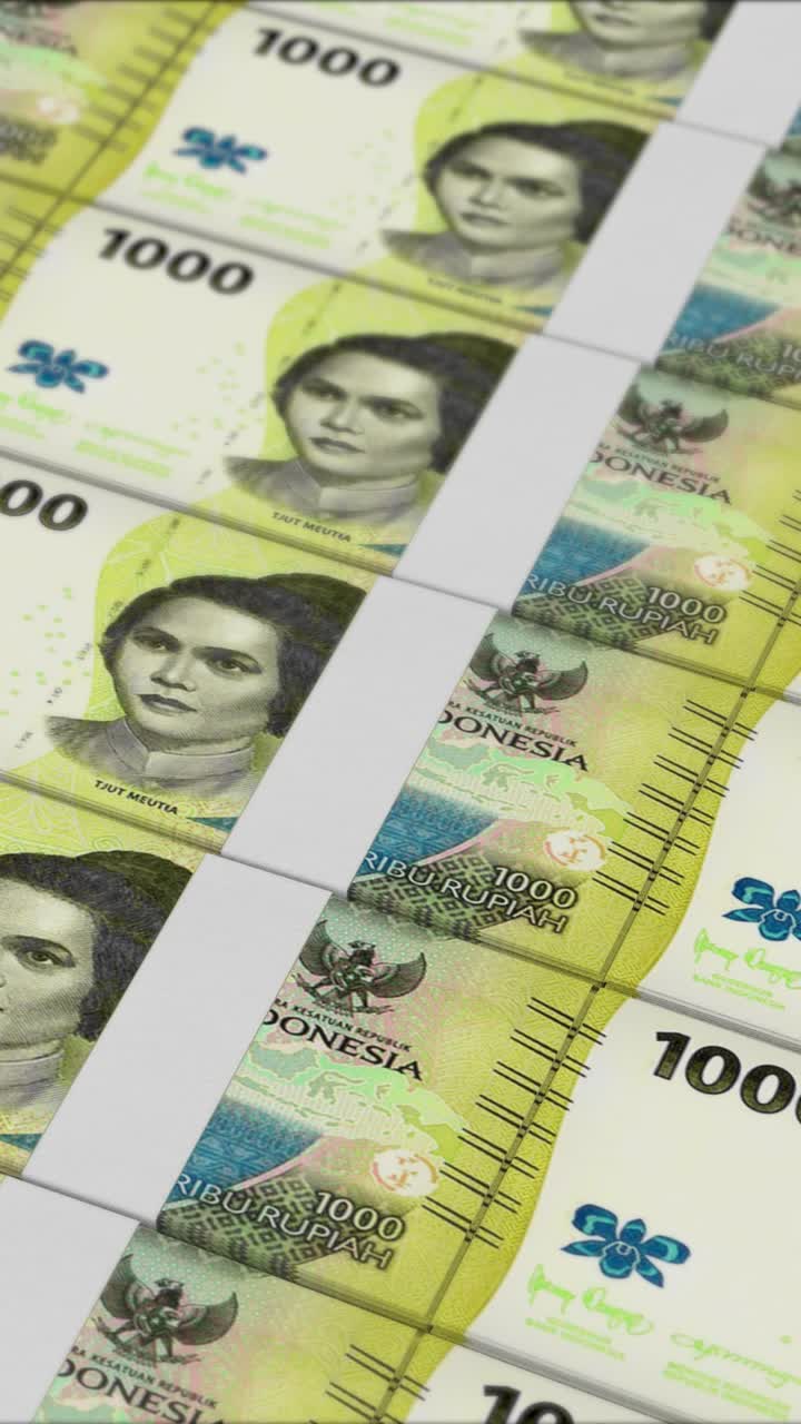 Video vertikal uang kertas 1000 RUPIAH INDONESIA dicetak oleh mesin uang