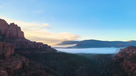 Fog-Around-Red-Rocks-at-Sunrise-in-Sedona-4K-Aerial-Drone-Footage