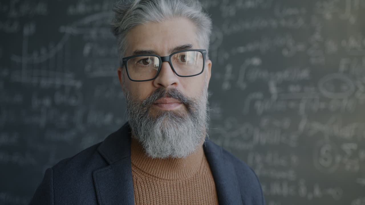 Portrait of a Thoughtful Man in a Classroom