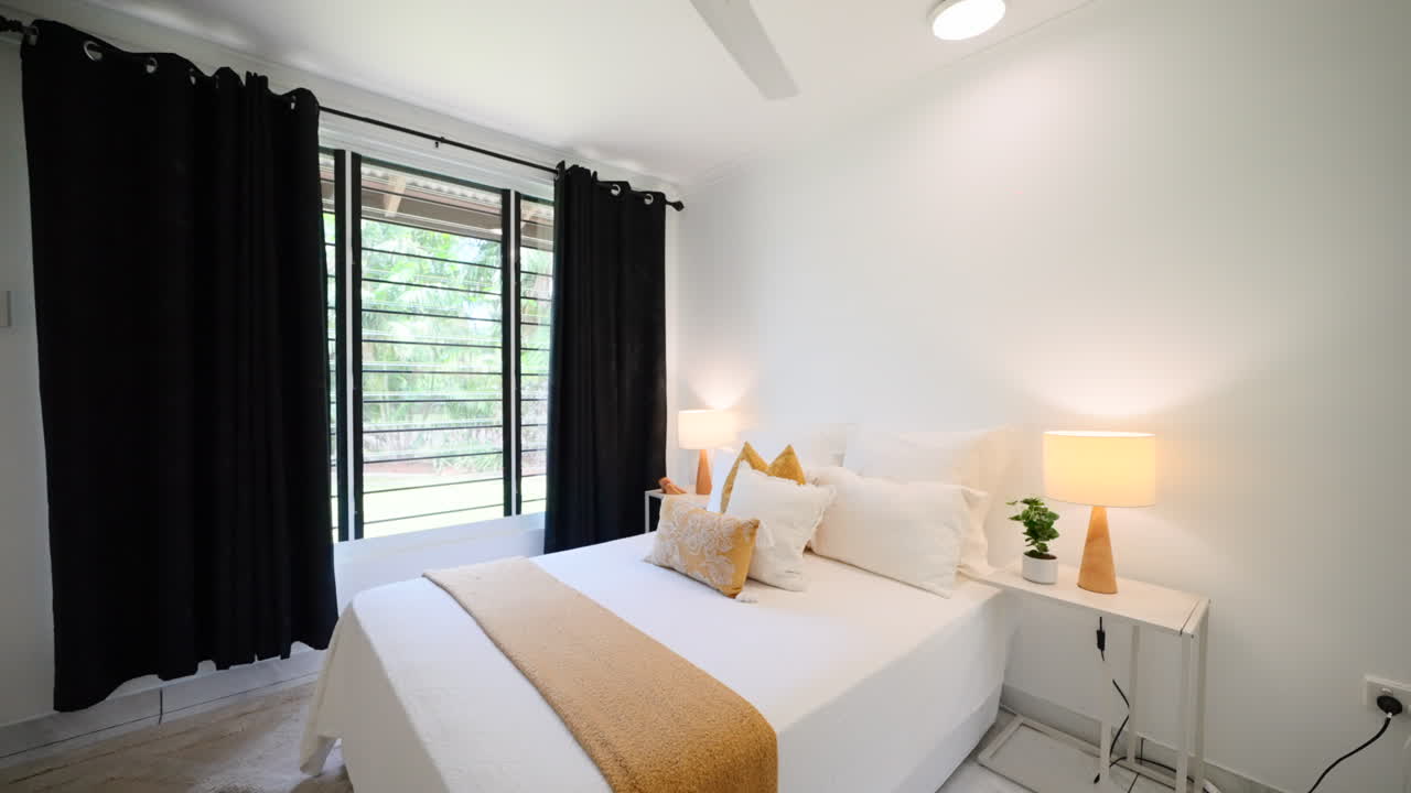 Establish of Contemporary Modern Decor Design Small Bedroom and open windows to yard. Interior of house home for real estate property.