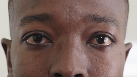 close-up-african-american-man-eyes-looking-sad-unhappy-expression-human-emotion