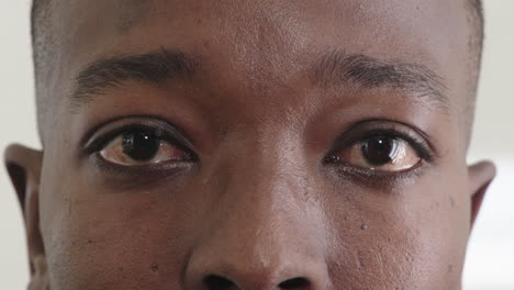 close up african american man eyes looking sad unhappy expression human emotion