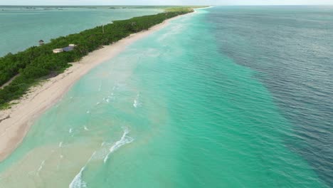 Drone aerial fly Tulum Beach with Turquoise Waters and White Sand, wide sea, natural peninsular reservoir