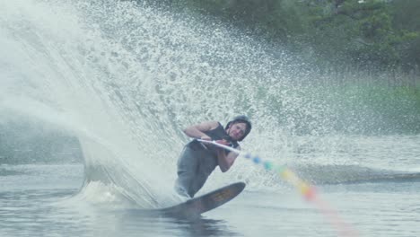 young man low slalom waterski cut slow motion