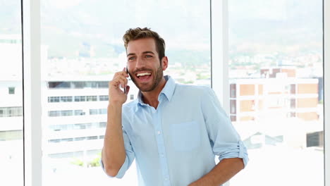 Happy-businessman-dancing-after-getting-good-news