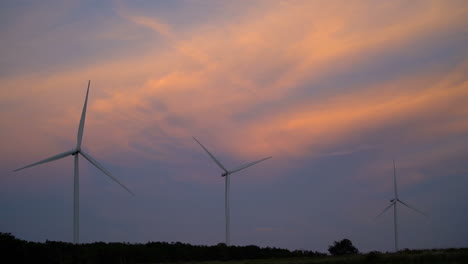 wind turbine farm. wind turbines under blue sky