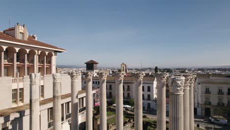 aerial riser showing marble pillars of ancient roman temple of cordoba