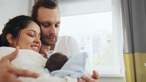 newborn baby with parents