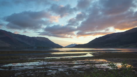 Loch-Leven-Stunning-Colourful-Sunset-Timelapse-from-Invercoe,-Scottish-Highlands,-Scotland
