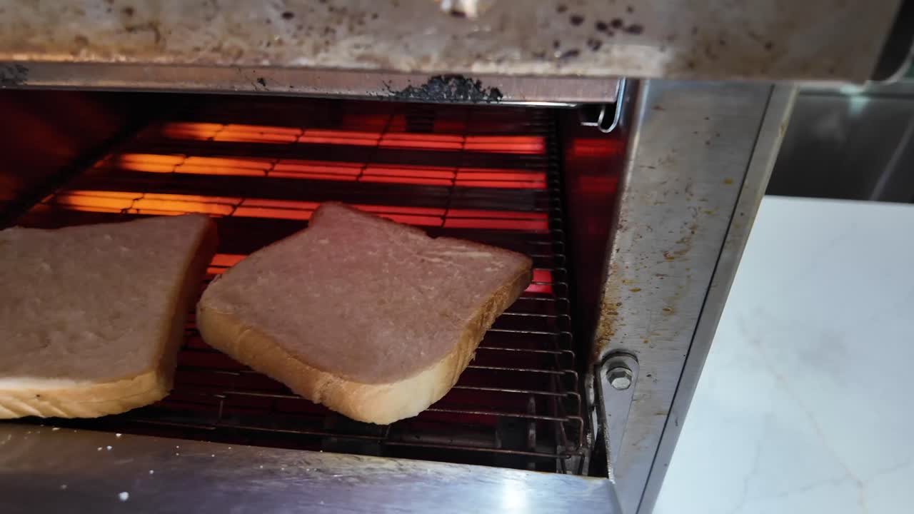 Toasting bread in a toaster
