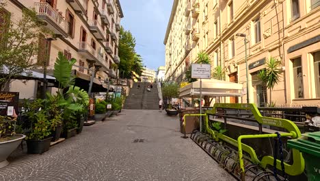 quiet alley with stairs and greenery