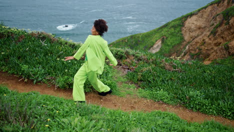 woman choreography dancing coast. african girl dancer performing modern dance.