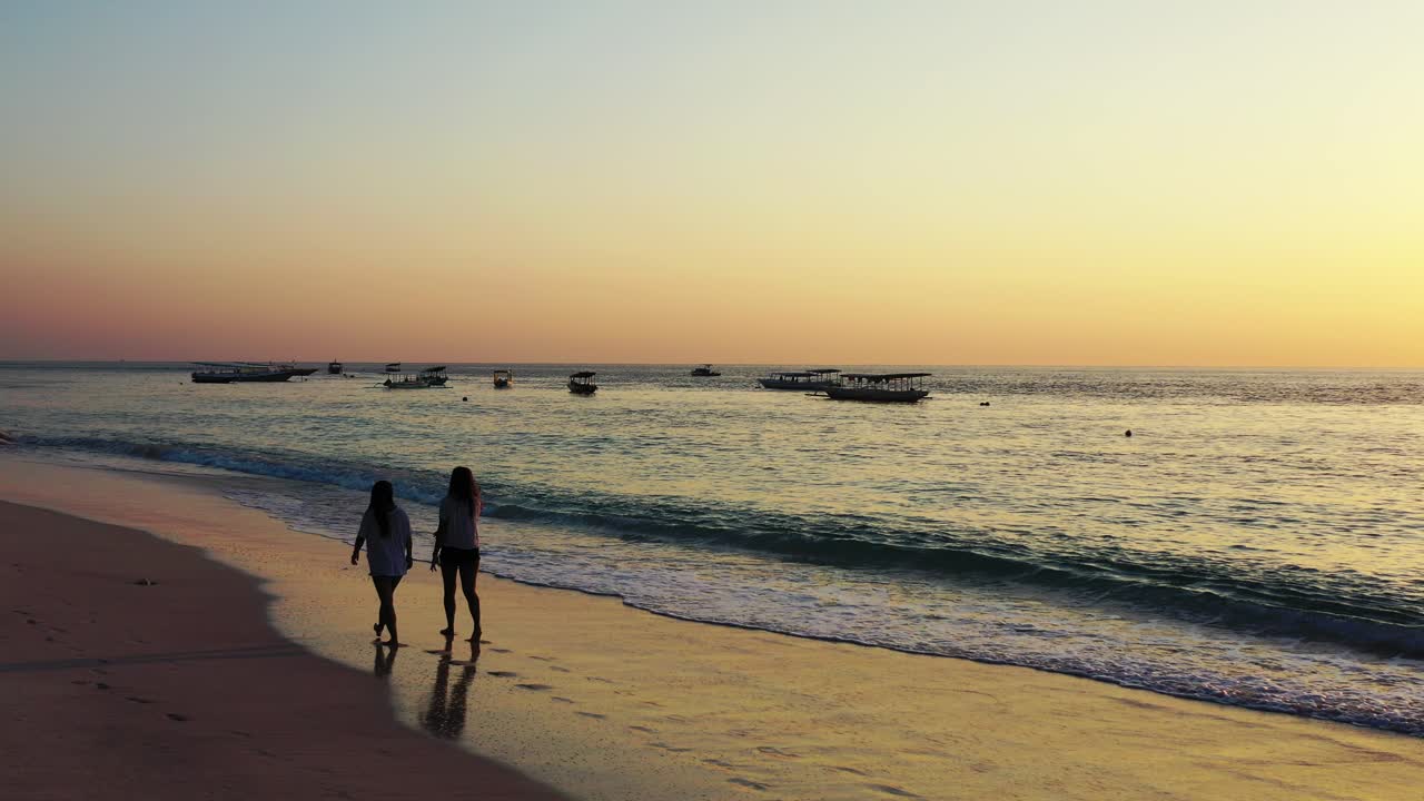 Bora Bora Island, South Pacific- A Vibrant Sunset, Splashing Ocean Waves, Floating Vessels, A Good Friend And A Nice Conversation -The Best Way To End The Day - Wide Shot