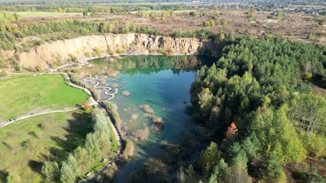 Aerial view of Arboretum Park Gródek in Poland with lakes, greenery, and walking paths in spring
