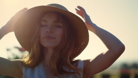 portrait of beautiful woman enjoying evening. closeup pretty girl closing eyes.