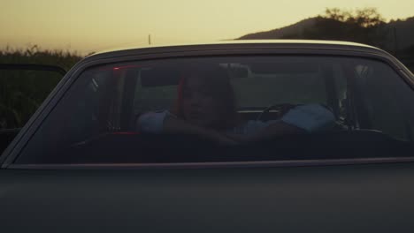 vintage car sunset road trip