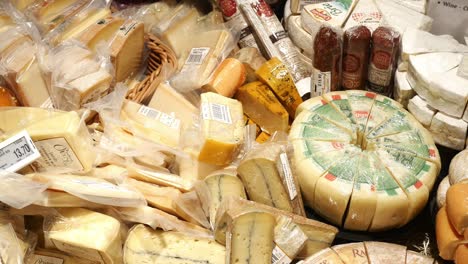 a delicious selection of gourmet cheeses and salami