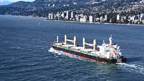 vancouver's gateway to the world: a container ship begins its journey from the harbour terminal