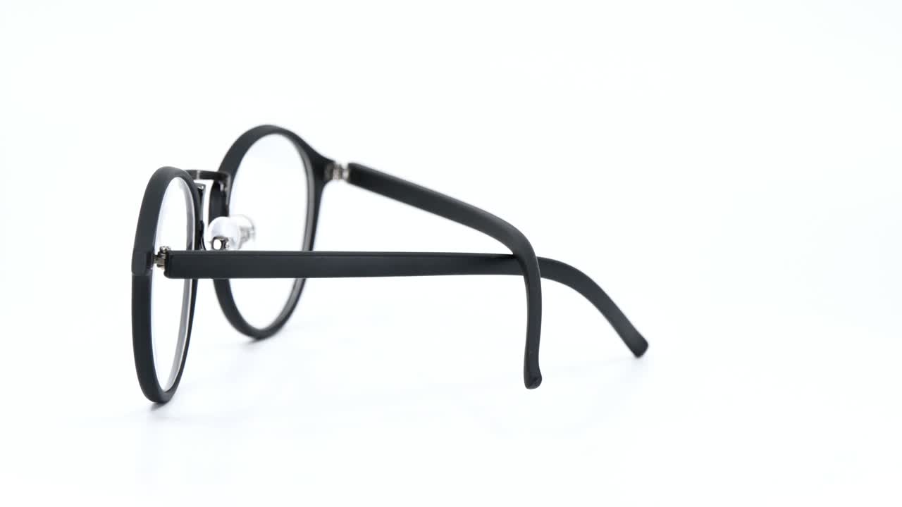 eyeglasses on white background, Black glasses round Motion round Degree Rotation.