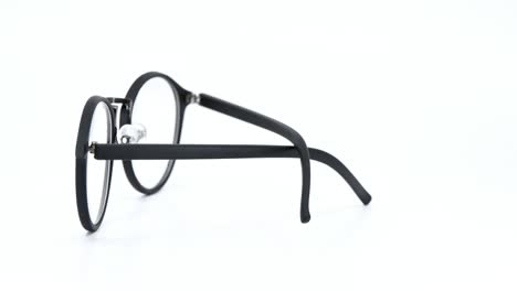 eyeglasses on white background, black glasses round motion round degree rotation.