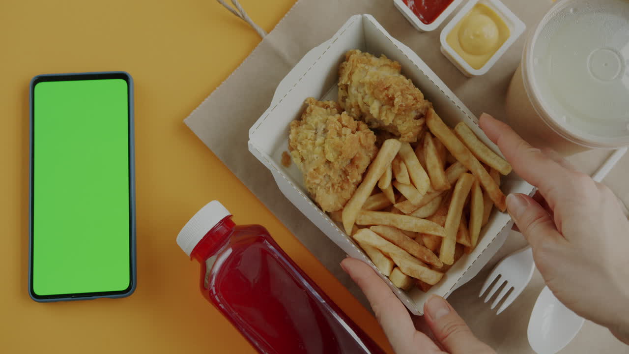 Fast Food Meal with Green Screen Phone