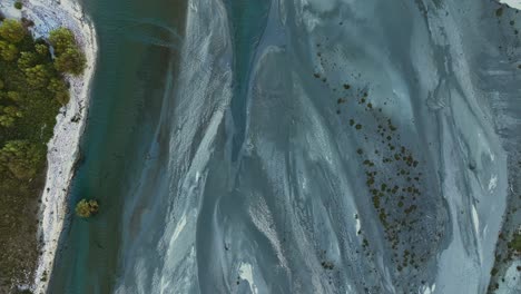 Lowland-floodplain-glacial-braided-deposits-lined-by-sandy-banks-meet-Lake-Wakatipu