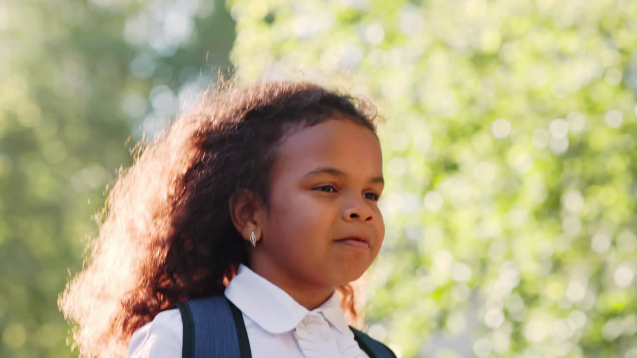 Schoolgirl walking outdoors