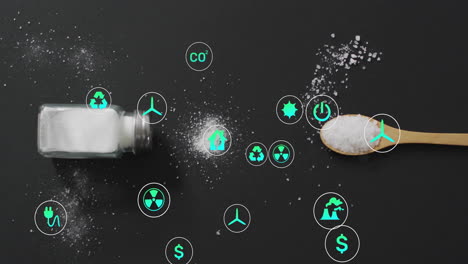 environmental icons with salt shaker and spoon on black background in animation