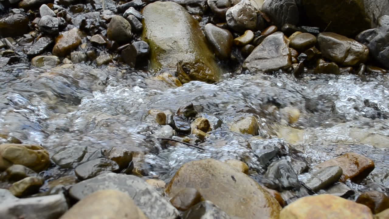 Mountain river. Stones and water