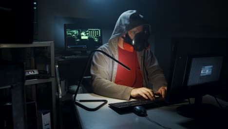 bio-terrorist types in computer code wearing a gas mask