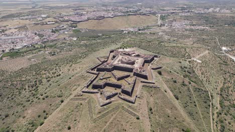 strategic symmetrical fortress nossa senhora da graça fort in elvas, portugal, circling aerial