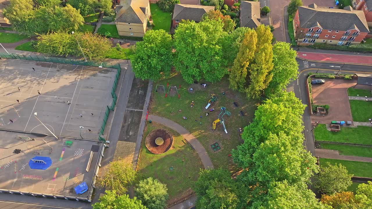 Children Playing At Playground In The Park In Sheffield, United Kingdom